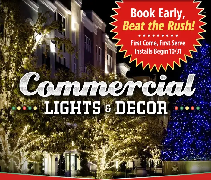 A courtyard near commercial buildings decorated with white and blue Christmas lights. Text overlays read 'Commercial Lights & Decor' and 'Book Early, Beat the Rush - First Come, First Serve Installs Begin 10/31'.